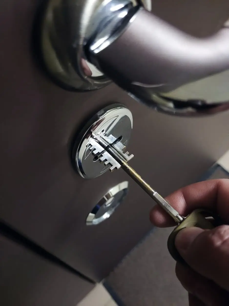 DGM locksmith fitting a high-security lock